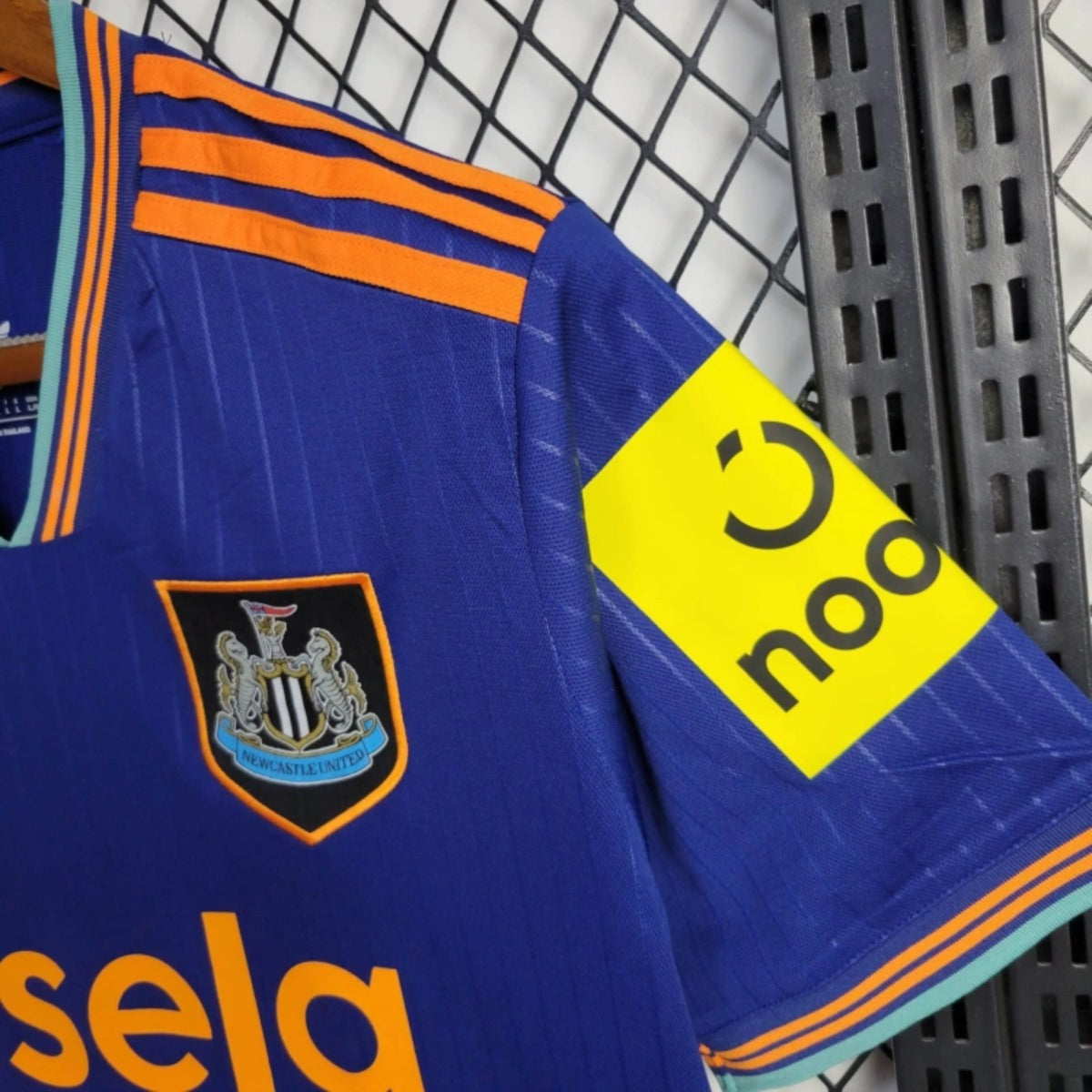Camisola NCU 2025-26 Alternativa Azul Versão Adepto