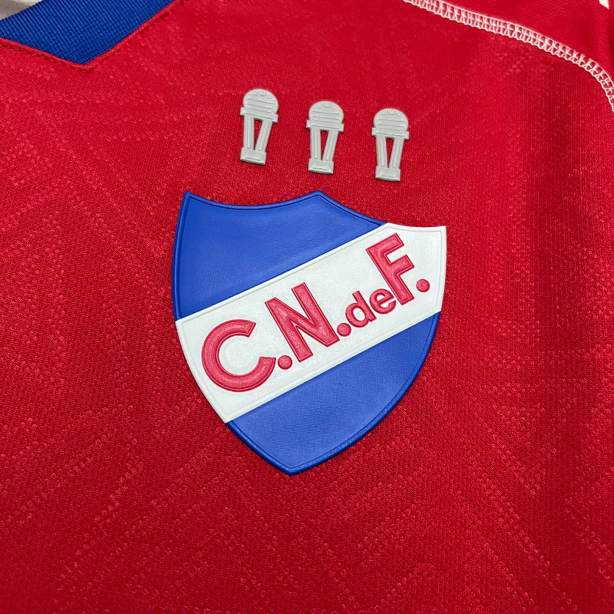 Camisola Club Nacional de Football 2025-26 Alternativa Vermelha Versão Adepto