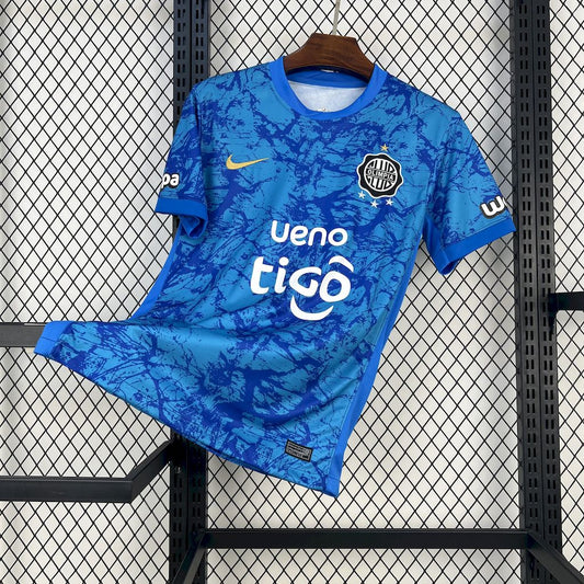 Camisola Olimpia Asuncion 2025-26 Alternativa Azul Versão Adepto