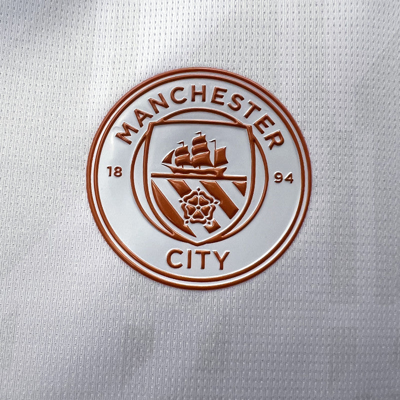 Camisola MCI 2023-24 Alternativa