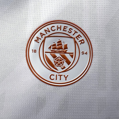 Camisola MCI 2023-24 Alternativa
