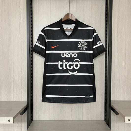 Camisola Olimpia Asuncion 2025-26 Alternativa Preta Versão Adepto