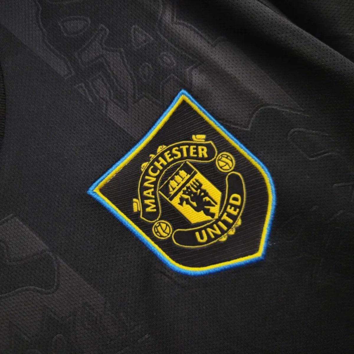 Camisola M-United 2025-26 Alternativa Preta Versão Mulher