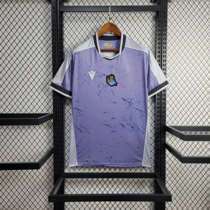 Camisola Real Sociedad 2025-26 Alternativa Azul Versão Adepto