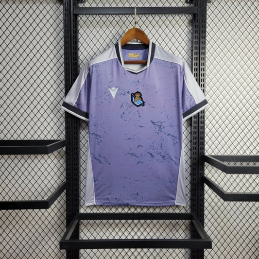 Camisola Real Sociedad 2025-26 Alternativa Azul Versão Adepto