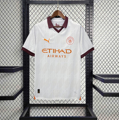 Camisola MCI 2023-24 Alternativa