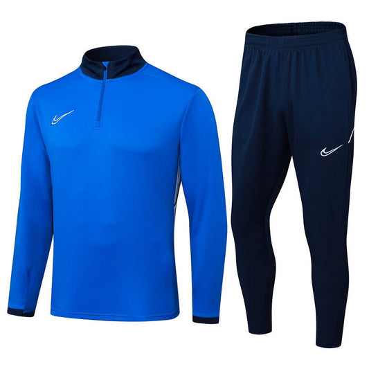 Fato de Treino N.I.K.E. 2025-26 - Camisola com Fecho