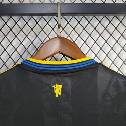 Camisola M-United 2025-26 Alternativa Preta Versão Mulher
