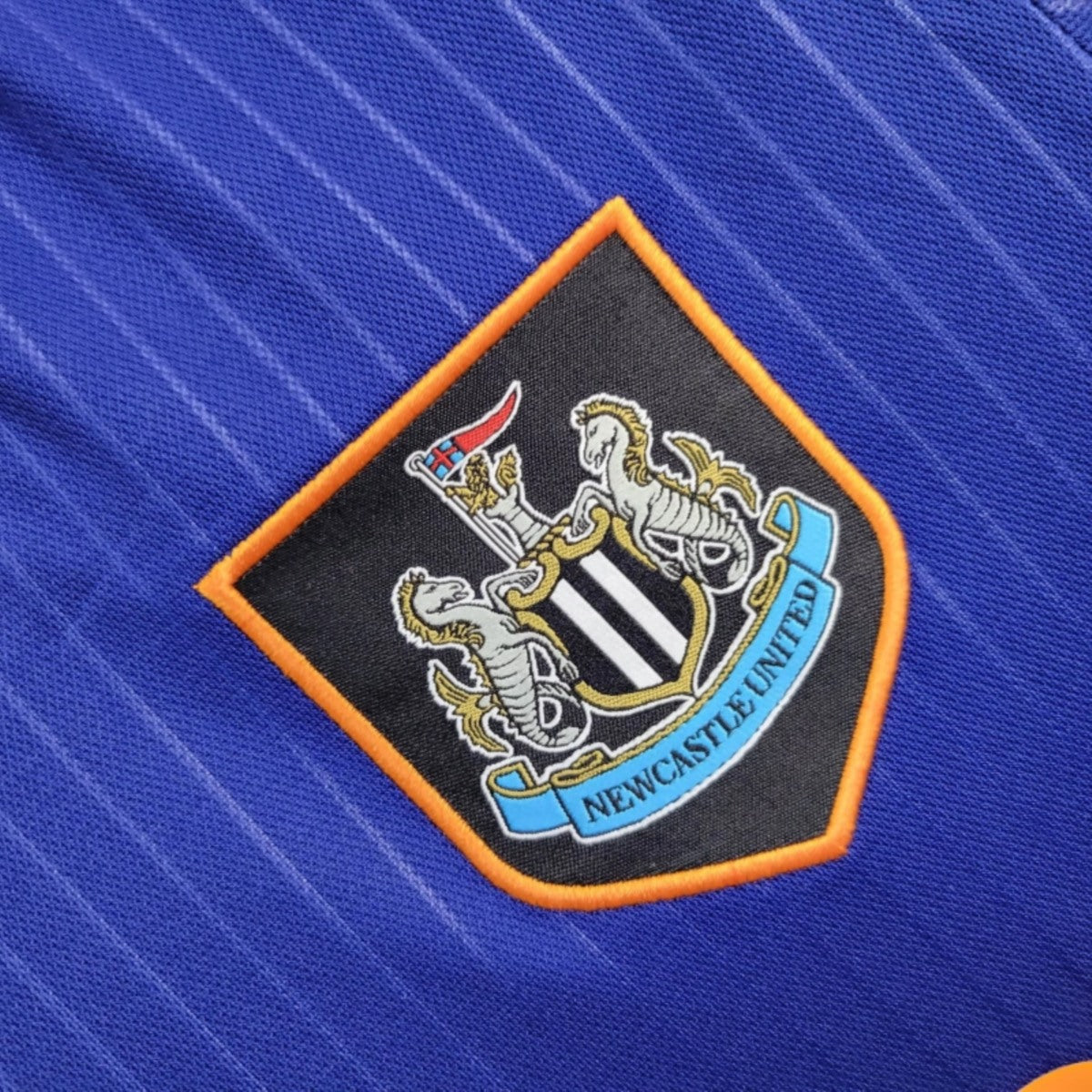 Camisola NCU 2025-26 Alternativa Azul Versão Adepto
