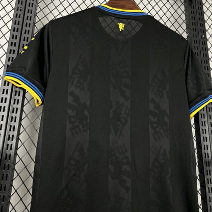 Camisola M-United 2025-26 Alternativa Preta Versão Adepto